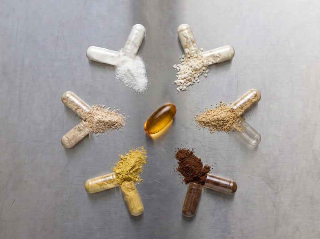 Supplement capsule formulations with vitamin, botanical, probiotic and omega-3 ingredients.