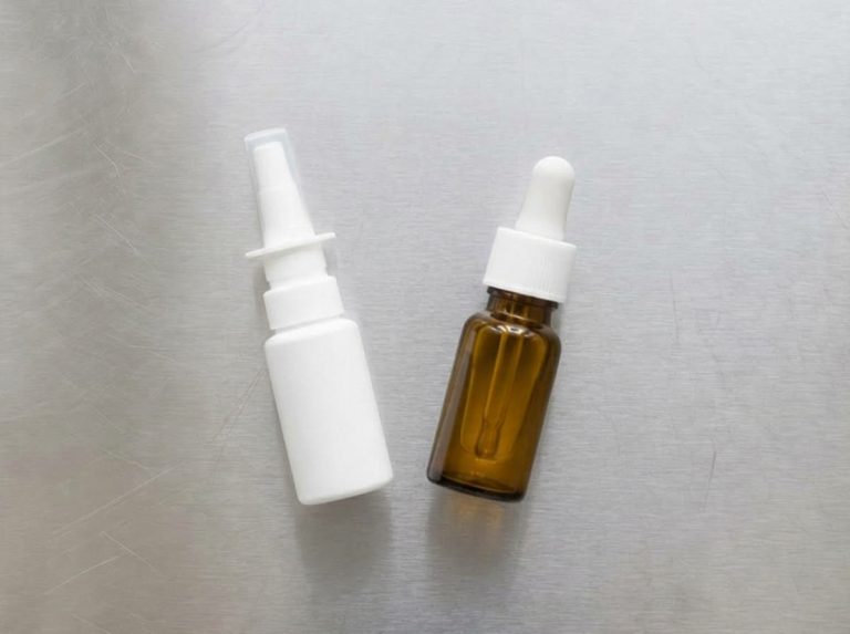 Oral spray and dropper bottle formats manufactured for liquid food supplements in a European GMP facility.
